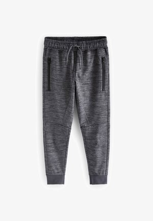 Szürke, sportos joggerek melírozott textúrával, elasztikus derékrésszel, zsinórral és két zipzáras zsebbel az oldalakon.