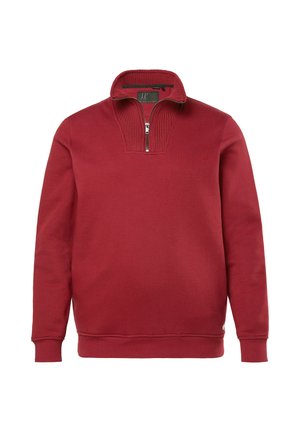 Červená mikina s dlouhým rukávem vyrobená z měkké látky. Má límec na půl zip s žebrovanými detaily a elastické manžety a lem.