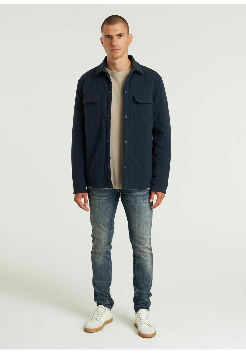 CHASIN’ Jas donkerblauw
