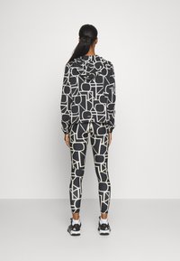 ONLY Play FONT LOGO TRAIN - Tights - black
