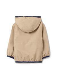 Beige hooded jacket met elastische boorden en een marineblauwe accent aan de zoom. Glad, lichtgewicht stof met een iets losse pasvorm.