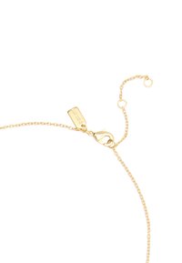 Guldkedja armband med en hummerlås, som har en liten tagg och justerbar längd. Tunna länkar skapar en texturerad yta.