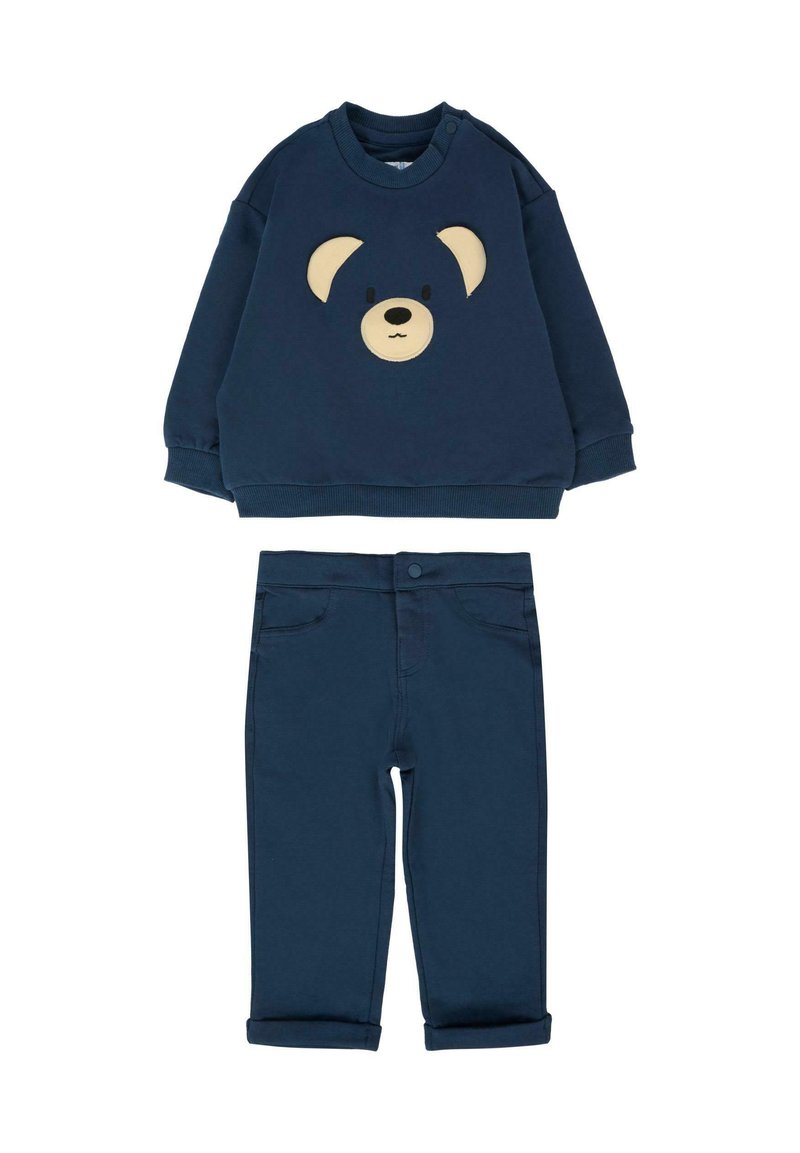 Marineblauwe sweatshirt met een berengezicht applicatie en bijpassende sportbroek met omslag. Gemaakt van katoen, met zachte texturen en een eenvoudig ontwerp.
