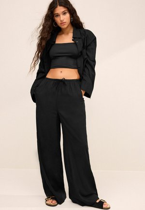 TIE WAIST WIDE LEG - Housut - black