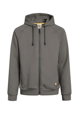 Grüner Kapuzenpullover mit Reißverschluss, Kordelzug, Fronttaschen, gerippten Bündchen und einem kleinen orangefarbenen runden Logo nahe dem unteren Saum.