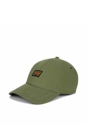 Casquette de baseball vert olive avec une visière incurvée et un écusson logo G-Star Originals noir et jaune sur le panneau avant.