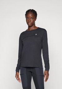 Long-sleeve shirt in dark grey with a round neckline and decorative stitching across the chest. Features a small logo on the left side.