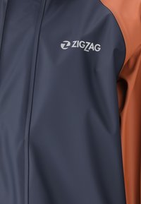 ZIGZAG SET - Regnbukser - umber