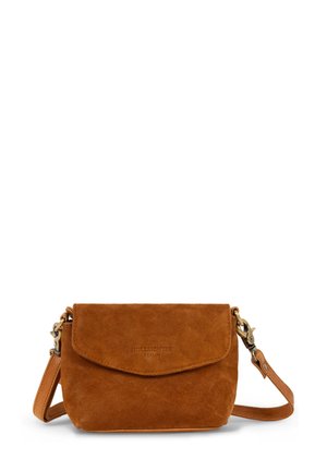 Suede crossbody bag in brown with a flap closure, adjustable strap, and metal hardware. Smooth texture with embossed brand logo detail.