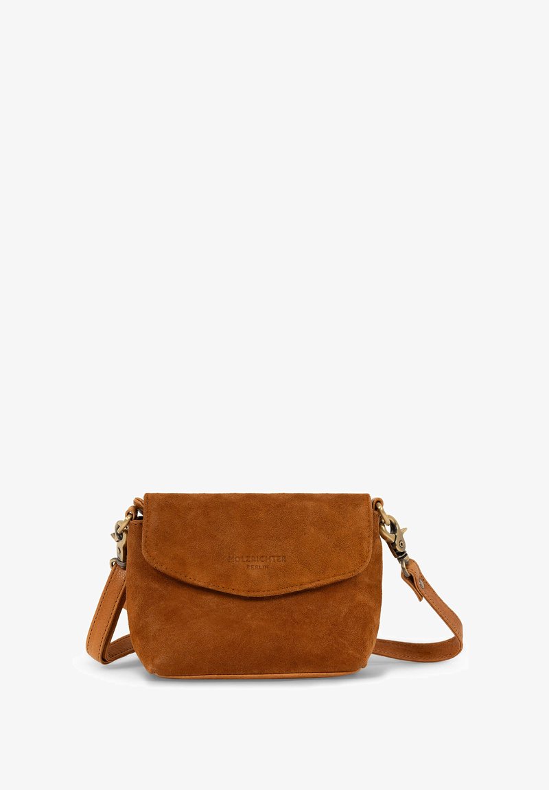Suede crossbody bag in brown with a flap closure, adjustable strap, and metal hardware. Smooth texture with embossed brand logo detail.
