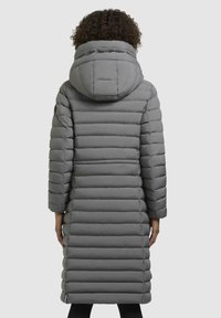 Gray puffer coat with a hood, featuring horizontal quilted sections, long length, and a smooth texture. Includes a back vent and side pockets.