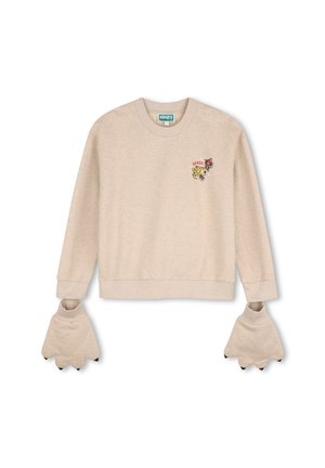 Sweat-shirt beige à manches longues avec têtes de léopard et de tigre brodées sur la poitrine et larges poignets en forme de pattes avec griffes noires.