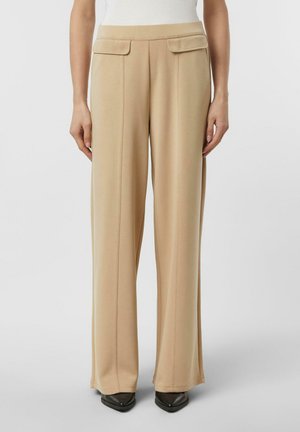 - Spodnie materiałowe