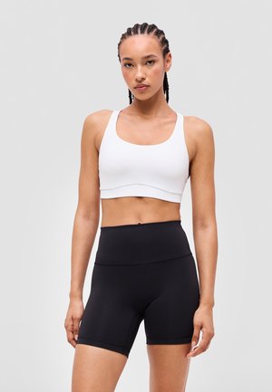 lululemon, ENERGY EVOLVE - Športová podprsenka so strednou podporou - white