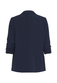 Tengerészkék, hosszú ujjú blézer, ráncolt ujjakkal, hátulról bemutatva, fehér háttér előtt.