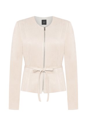 Veste ajustée beige à manches longues, fermeture éclair frontale, col rond et ceinture nouée à la taille.