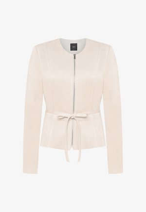 Veste ajustée beige à manches longues, fermeture éclair frontale, col rond et ceinture nouée à la taille.