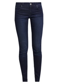 Dark blue skinny jeans made of denim, featuring a mid-rise waist, five-pocket design, and metal button closure with brand logo.