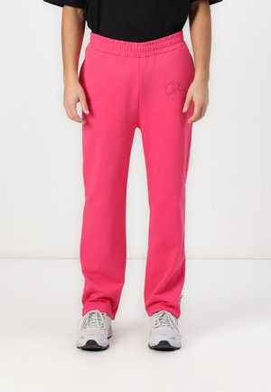 JOGGPANTS - Tracksuit bottoms - pink