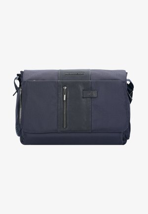 Borsa a messaggero navy realizzata in tessuto testurizzato, con accenti in cuoio liscio a contrasto, una tasca frontale con zip e una tracolla regolabile.