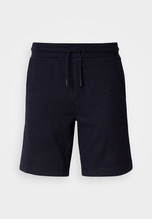Granatowe szorty z elastycznym paskiem i sznurkiem do regulacji. Teksturowana tkanina o gładkim wykończeniu, z bocznymi szwami.
