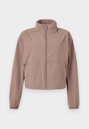 Veste mauve claire à fermeture éclair avec col montant, poignets élastiques et poches zippées, présentée à plat sur un fond blanc.