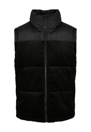 Chaleco acolchado negro con cuello alto. La mitad superior está hecha de una tela suave, mientras que la mitad inferior tiene una textura acanalada. Cierre frontal con cremallera y bolsillos laterales.