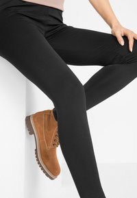 bonprix Leggings - schwarz