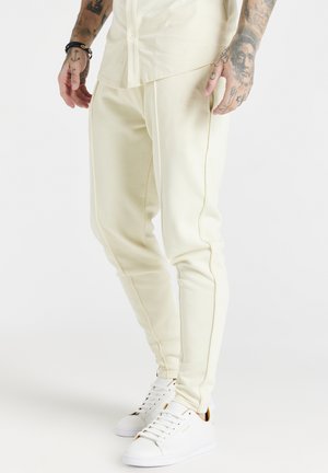 SMART ESSENTIAL - Pantalones deportivos - ecru