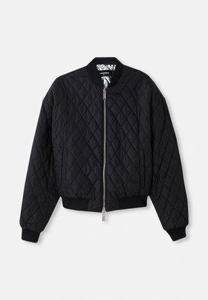 Black quilted bomber jacket with zip closure, ribbed cuffs, and collar. Features two side pockets and subtle sheen on the interior lining.