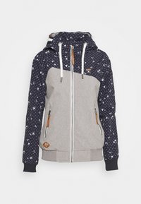 Huvjacka med övre del i halv marinblått mönster och grå underdel, med vit dragkedja, snoddar och läderdetaljer på fickorna.