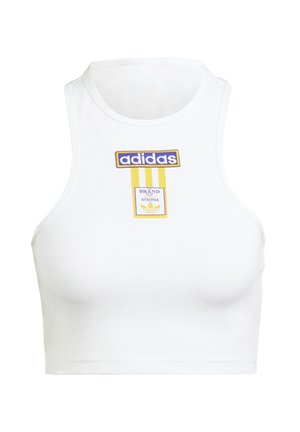 Hvit, ribbet crop-top med høy hals. Har blå og gule «adidas»-logoer og merkeetiketter på fremsiden.