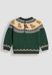 Grüner Strickpullover mit knopfbarem Rücken, featuring einer weißen Schulterpartie mit Hundemotiven und Zickzackmustern in Blau, Orange und Braun.