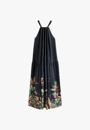 Black halter-neck maxi dress with loose fit, featuring tropical leaf and flower prints along the hem.