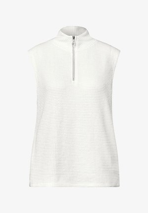 Witte mouwloze top met een hoge kraag en een ¼ rits sluiting. De textuur van de stof heeft een ruitpatroon en biedt een lichte, ademende ontwerpeigenschap.