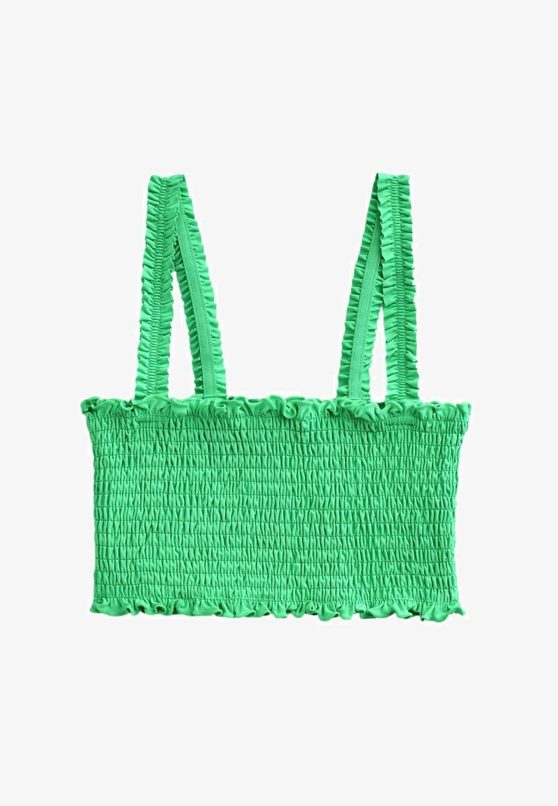 Crop top vert vif avec smocks, fines bretelles à volants et bords volantés en haut et en bas.