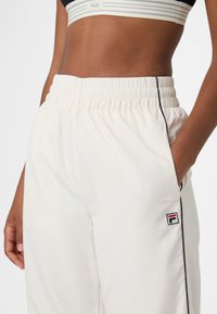Fila Verryttelyhousut - egret