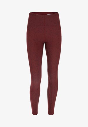 Leggings bordeaux avec un imprimé animal discret, taille haute et matière lisse et extensible pour le confort et la flexibilité.