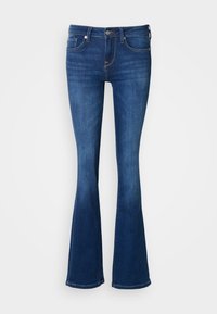 Granatowe dzwony jeansowe z denimu. Średni stan, pięciokieszeniowy krój z subtelnymi detalami przeszyć. Miękka faktura, dopasowane na udach.