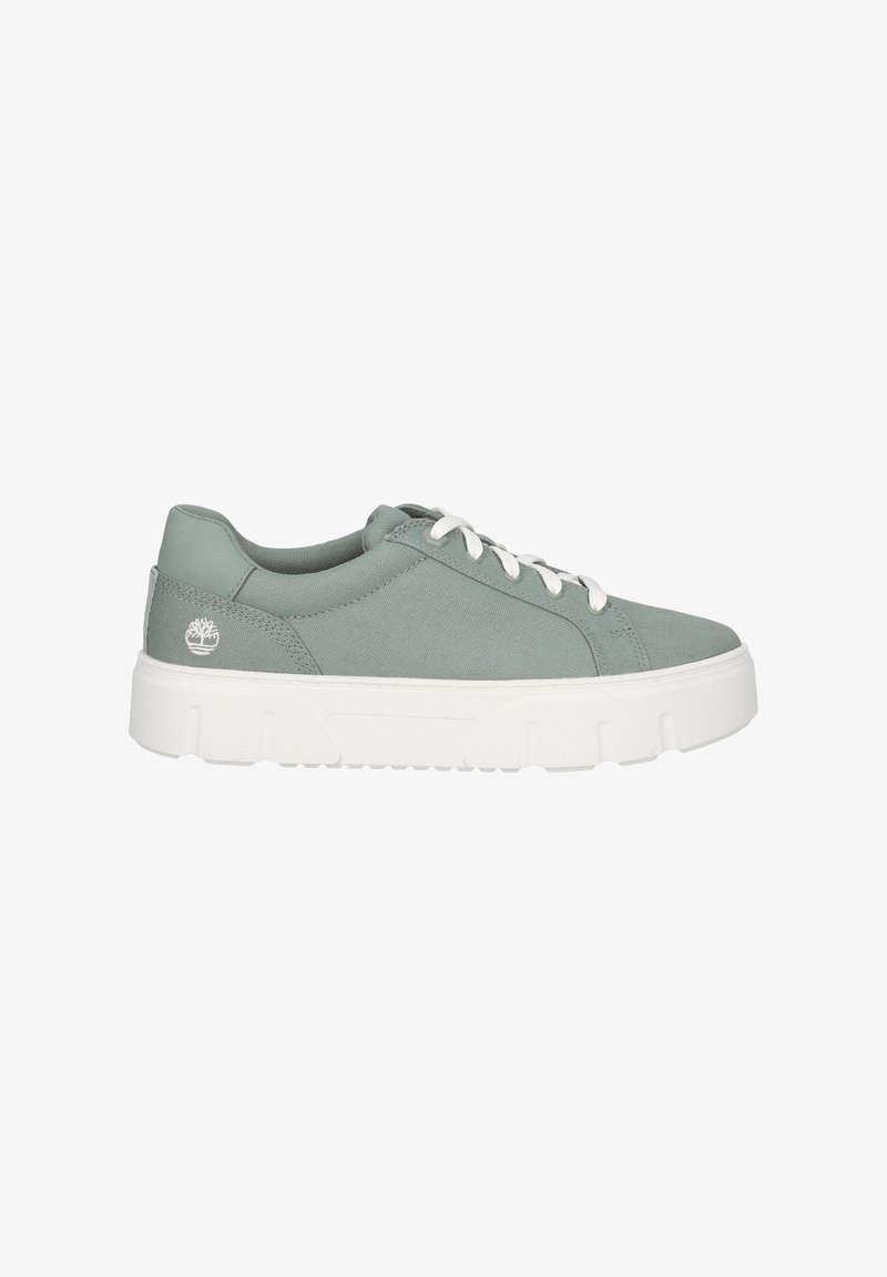 Light green canvas sneakers with white rubber sole. Features round toe, lace-up design, and a small logo accent on the side.
