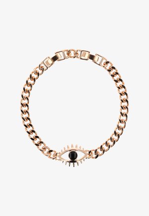Złota bransoletka z łańcuszkiem z zawieszką w kształcie oka, z czarnym środkiem i małymi kolcami przypominającymi rzęsy.