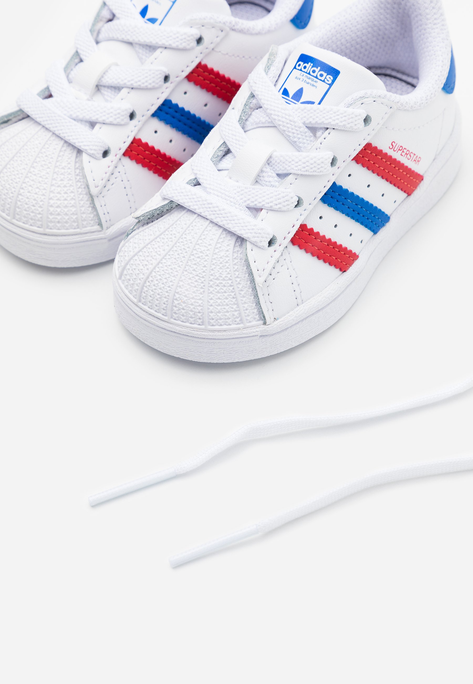 blue adidas originals trainers