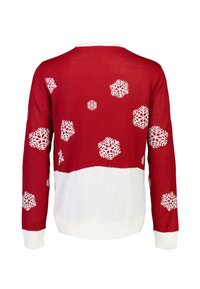 Czerwony sweter robiony na drutach z białymi wzorami w śnieżynki, z kontrastującą białą dolną częścią oraz ściągaczami na rękawach i u dołu.