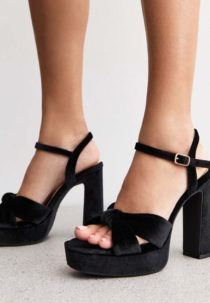 High heeled sandals - black