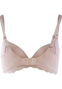 Lace bh in nude kleur met gladde cups, verstelbare banden, gegolfde randen en een haak-en-oog sluiting aan de achterkant.