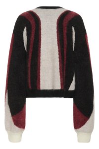 Flauschiger Langarmpullover mit schwarzen, roten und weißen geschwungenen sowie vertikalen Streifen, taillierter Schnitt und gerippten weißen Bündchen.