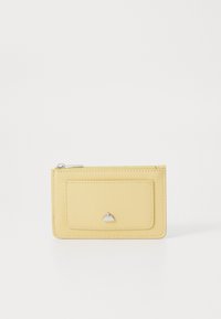 Atlasīts, light yellow