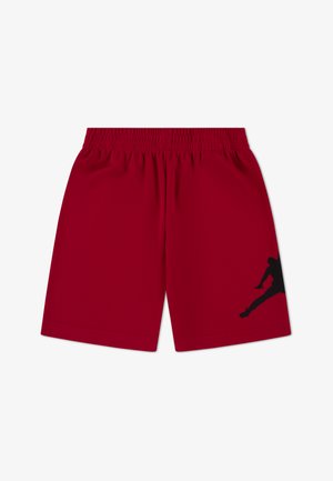 Piros sport rövidnadrág hálós anyagból, elasztikus derékpánthoz, bal lábszáron fekete sziluett grafikával.