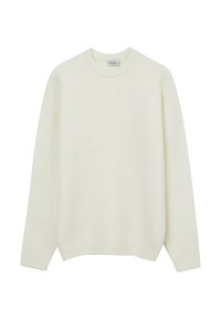 Pull crème clair en tissu doux, avec un col rond, des manches longues, et des poignets et un ourlet côtelés. Finition simple et texturée.