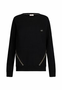 Sweat-shirt noir en tissu doux, avec manches longues, col rond et accents métalliques sur les côtés. Petit logo sur la poitrine.